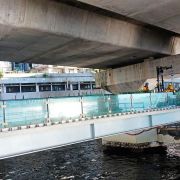 The Boardwalk deck finishing works near City Garden were progressing in full swing. The image shows the installation of glass balustrade